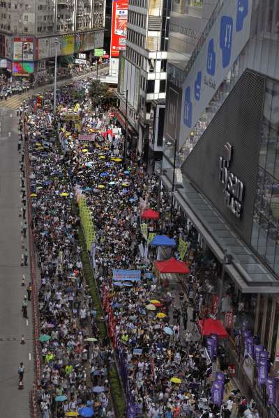 2018年7月1日，香港回歸中國21周年，香港泛民團體發起七一遊行，今年遊行主題是「結束一黨專政 拒絕香港沉淪」（AP）