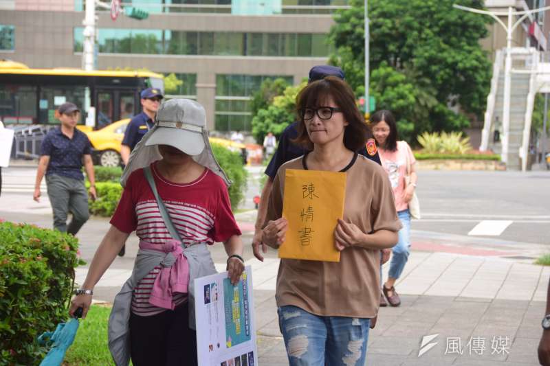 20190821-全國十二年國教副理事長陳綺貞出席「全國十二年國教家長聯盟舉報清華大學涉及利益勾結」記者會。(吳俊廷攝) 20190821-全國十二年國教副理事長陳綺貞出席「全國十二年國教家長聯盟舉報清華大學涉及利益勾結」記者會。(吳俊廷攝)