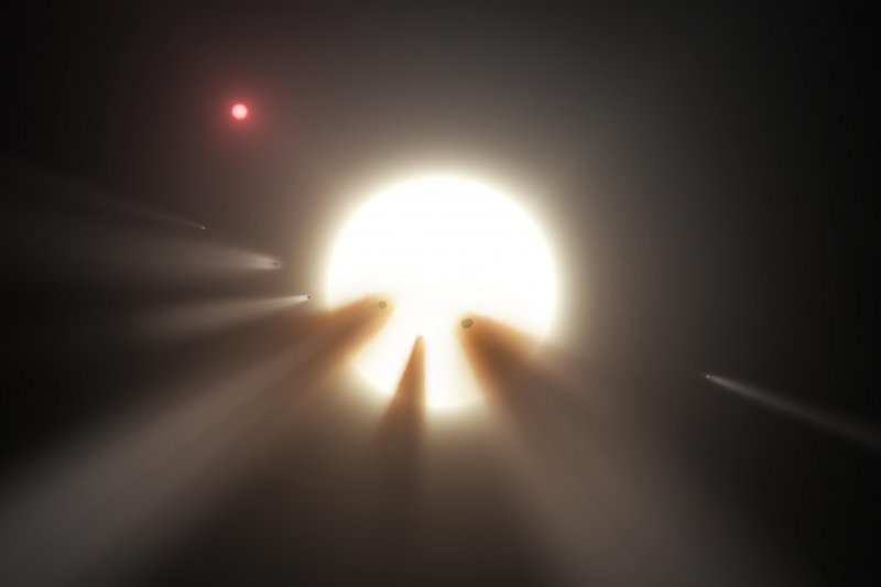 塔碧星(Tabby's star)光度變化假說,一群崩解的彗星擋住光線(Wikipedia / Public Domain) 塔碧星(Tabby's star)光度變化假說,一群崩解的彗星擋住光線(Wikipedia / Public Domain)