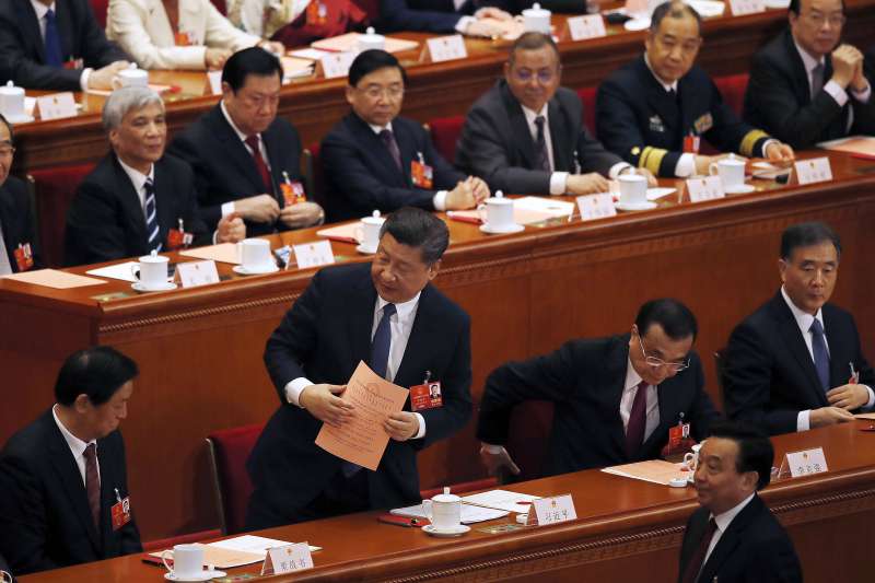 2018年3月11日,中國第十三屆全國人大一次會議表決通過包括取消國家主席任期在內的修憲案(AP) 2018年3月11日,中國第十三屆全國人大一次會議表決通過包括取消國家主席任期在內的修憲案(AP)