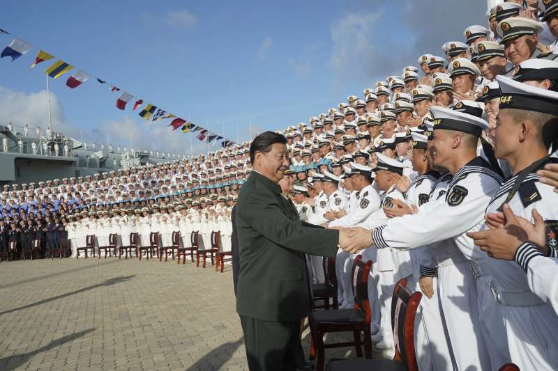 2019年12月，習近平主持中國第一艘國產航空母艦「山東號」下水典禮（AP）