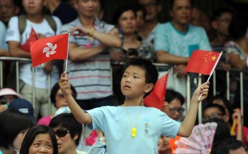 香港回歸十八週年,人心都回歸了嗎?(中新網) 香港回歸十八週年,人心都回歸了嗎?(中新網)