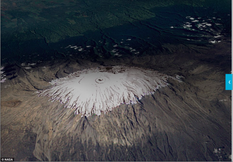 位於坦尚尼亞的非洲最高峰，頂部是雪白的冰原。（圖／NASA）