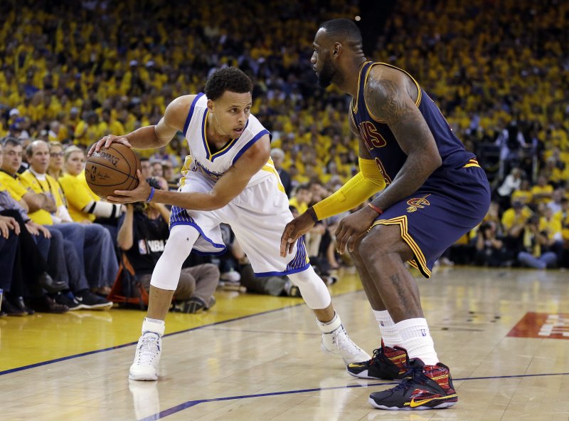 勇士隊Curry、騎士隊James。(美聯社) 勇士隊Curry、騎士隊James。(美聯社)