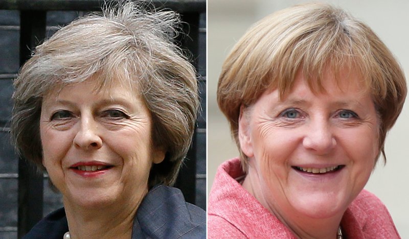 英國新任首相梅伊(Theresa May)與德國總理梅克爾(Angela Merkel)(美聯社) 英國新任首相梅伊(Theresa May)與德國總理梅克爾(Angela Merkel)(美聯社)
