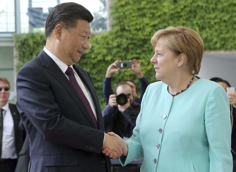 G20峰會即將在德國漢堡舉行,德國總理梅克爾迎接中國國家主席習近平來訪(AP) G20峰會即將在德國漢堡舉行,德國總理梅克爾迎接中國國家主席習近平來訪(AP)